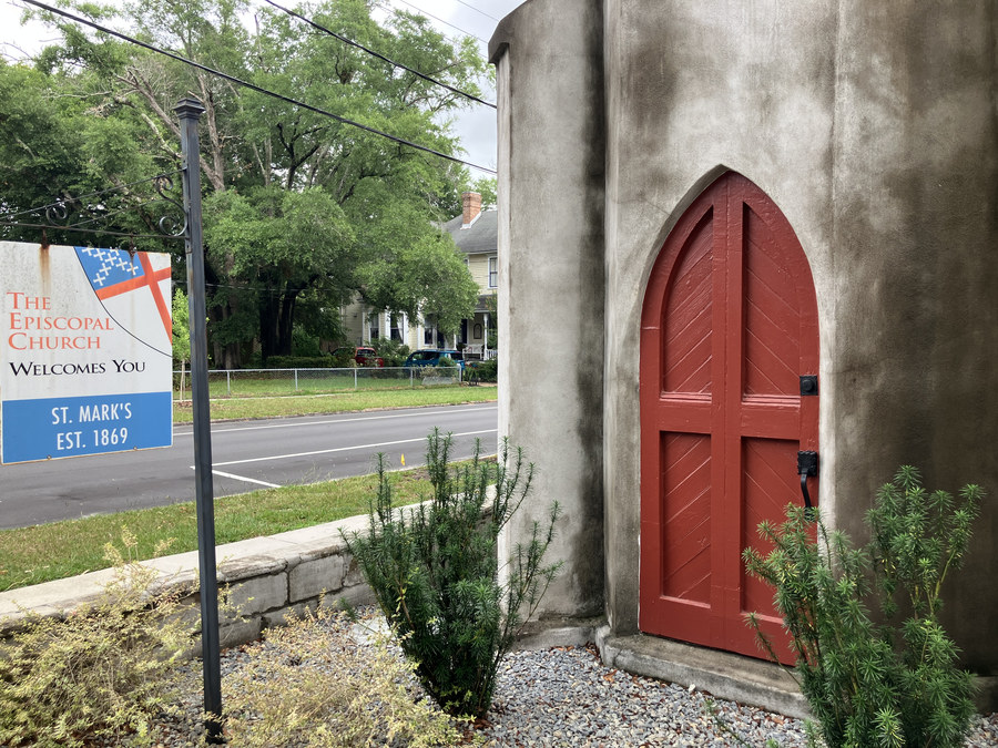 St. Mark’s Episcopal Church: street sign and red side entrance