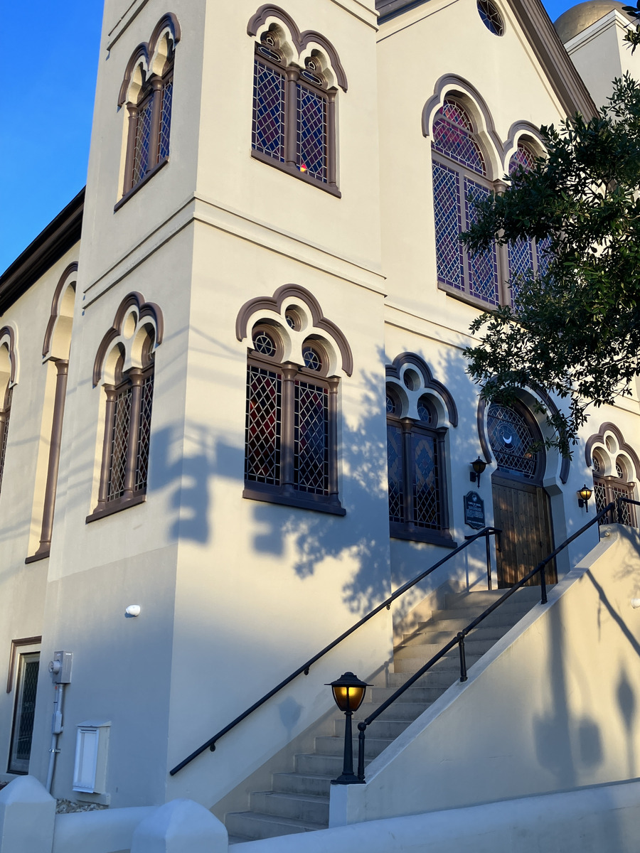 Temple of Israel: side entrance, twin towers, and moorish-arched windows