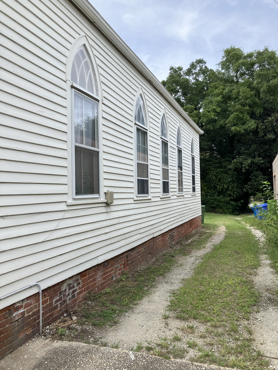 Terra Sol Sanctuary: rearward view along the side elevation