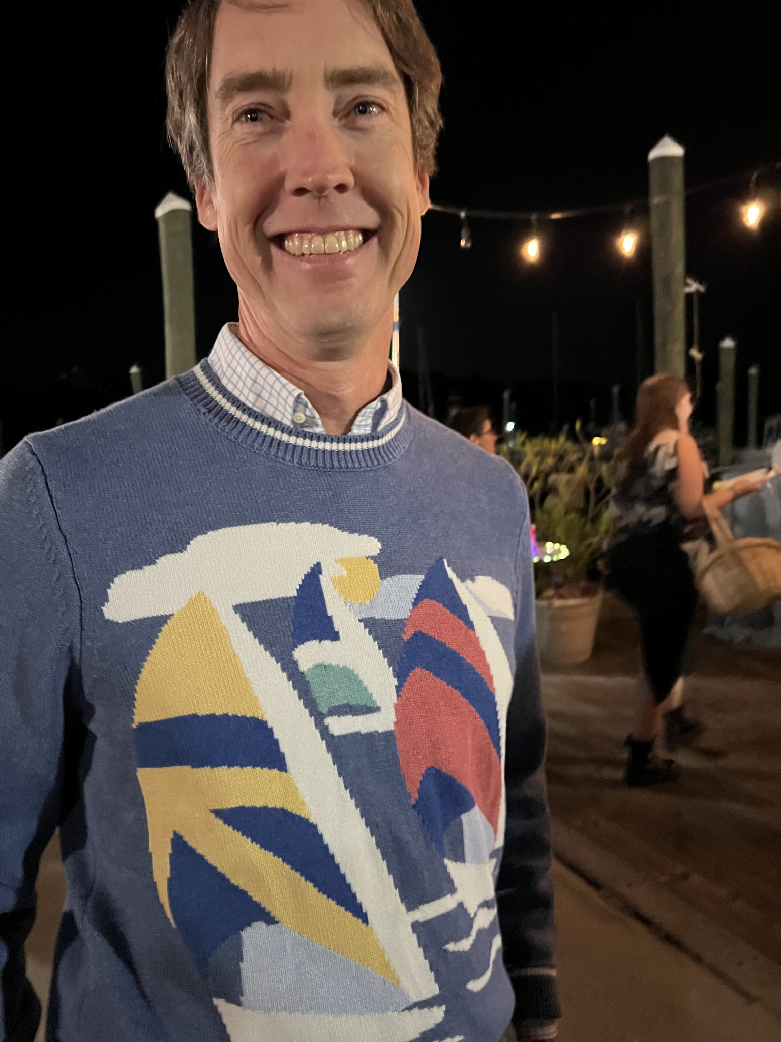 An evening outdoors in a sailboat-pattern sweater.